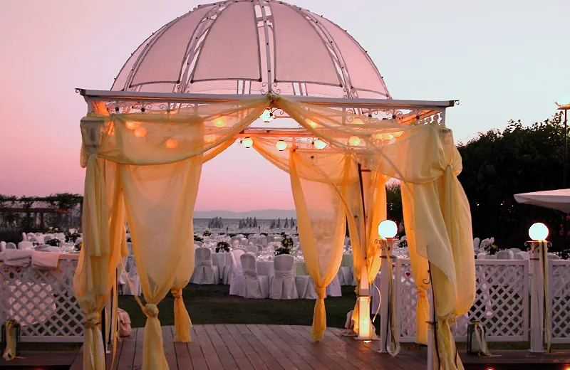 Decorated wedding gazebo at sunset