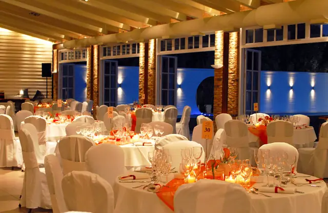 Set tables in the reception hall