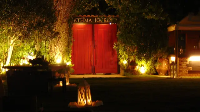 Ktima Jockey entrance at night