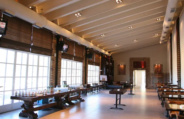 Indoor hall with wooden tables