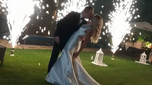 The couple's kiss with fireworks