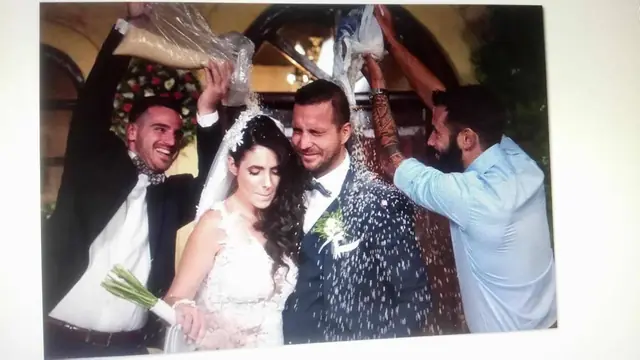 Bride and groom celebrating with guests