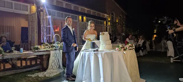 Bride and groom cutting the cake
