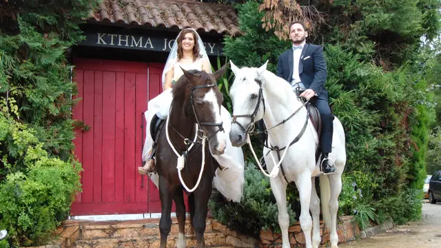 Bride and groom on horseback at Ktima Jockey