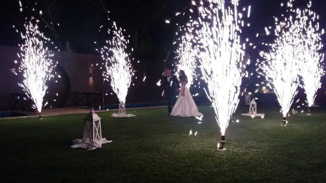 Bride with fireworks in the garden
