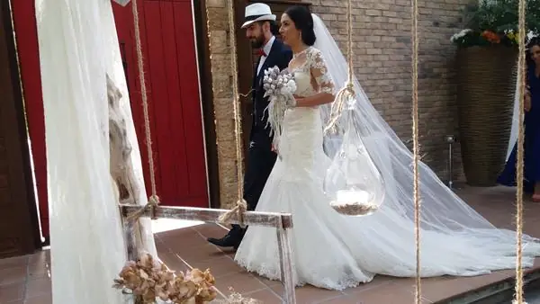 Bride on a swing in the garden