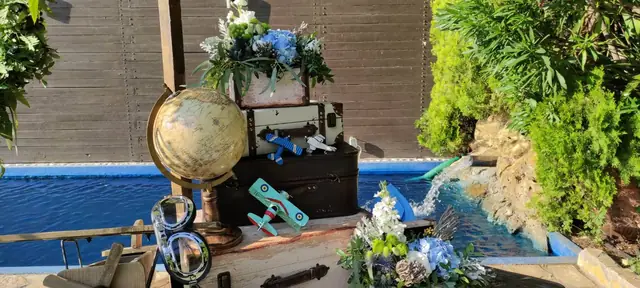 Themed baptism decoration beside the pool