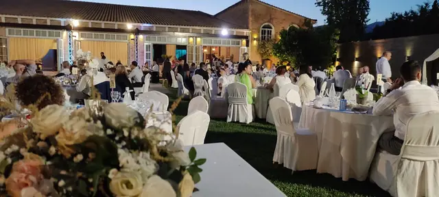 Reception tables with flowers in the garden